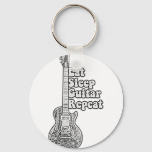 Eat sleep guitar repeat. vintage black and white key ring