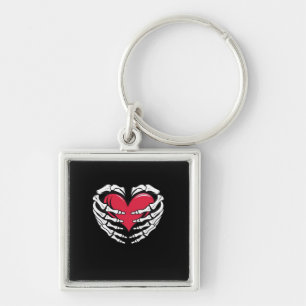 Ed Heart In Skeletal Hands Classic Key Ring
