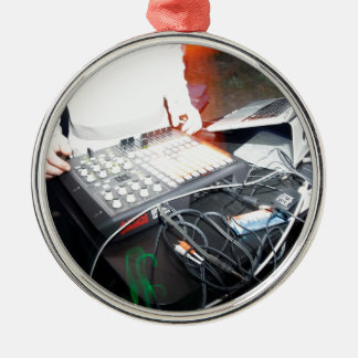 EDM DJ mixing music at an underground show Metal Tree Decoration