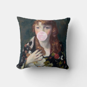 Edna blowing a pink bubble gum cushion