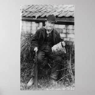 Edward Bingham holding one of his Castle Poster