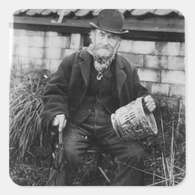 Edward Bingham holding one of his Castle Square Sticker (Front)