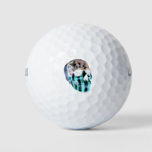 Eerie negative image of a painted skull golf balls