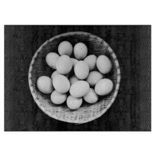 Eggs in Basket Black and White Fine Art Photograph Cutting Board
