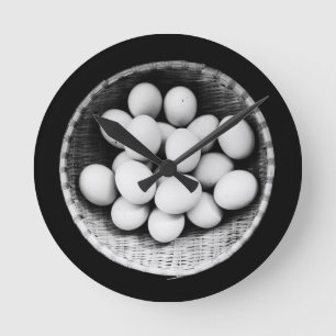 Eggs in Basket Black and White Fine Art Photograph Round Clock