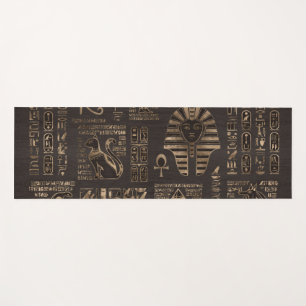 Egyptian hieroglyphs and deities - gold on wood yoga mat