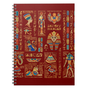 Egyptian hieroglyphs and deities on red notebook