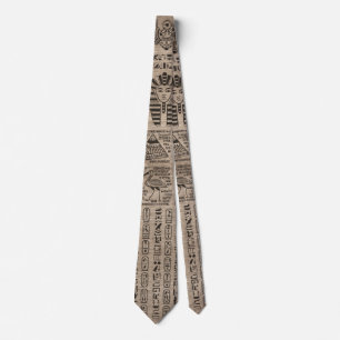 Egyptian hieroglyphs and symbols on wood tie
