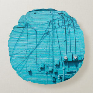 ELECTRIC METER ON BLUE BRICK WALL ROUND CUSHION