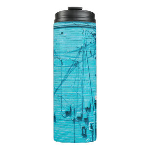 ELECTRIC METER ON BLUE BRICK WALL THERMAL TUMBLER