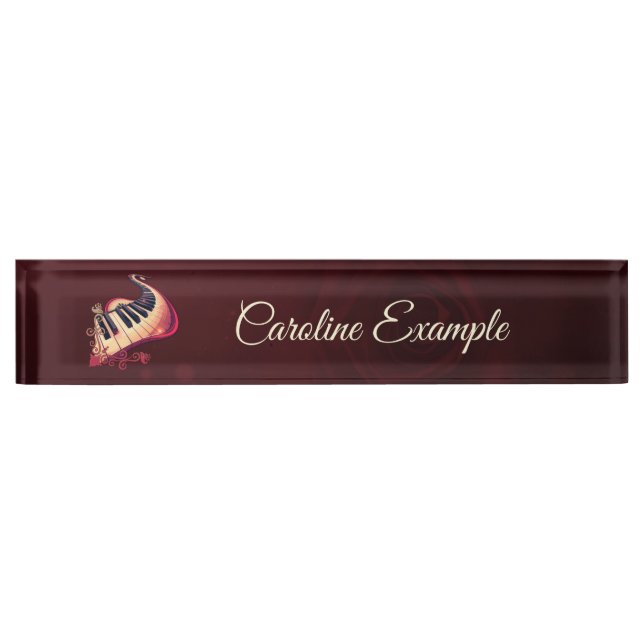 Elegance in motion, the curved piano nameplate (Front)