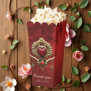 Elegance in red lustre with an ornate heart.  favour box