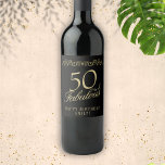 Elegant 50 and Fabulous Ornament 50th Birthday Wine Label<br><div class="desc">Elegant 50 and Fabulous Ornament 50th Birthday Wine Label. 50 and fabulous text in trendy golden script and an elegant ornament on black background. Personalise it with your name and your age,  and make personalised elegant wine labels for a woman`s birthday party.</div>