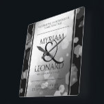 Elegant 70th Platinum Wedding Anniversary Square Wall Clock<br><div class="desc">Celebrate the 70th wedding anniversary with this commemorative clock! Elegant black serif lettering with hexagonal confetti on a platinum foil background edged by black bars add a memorable touch for this special occasion and extraordinary milestone. Customise with the happy couple's names, and add dates for their platinum anniversary. Personalised messages...</div>