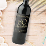 Elegant 80 and Fabulous Ornament 80th Birthday Wine Label<br><div class="desc">Elegant 80 and Fabulous Ornament 80th Birthday Wine Label. 80 and fabulous text in trendy golden script and an elegant ornament on black background. Personalise it with your name and your age,  and make personalised elegant wine labels for a woman`s birthday party.</div>