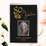 Elegant 80 and Fabulous Twigs 80th Birthday Photo Card<br><div class="desc">Elegant 80 and Fabulous Gold Twigs 80th Birthday Photo Card. 80 and fabulous text in trendy golden script and an elegant gold twig with leaves on a black background. Personalise it with your name and photo, and make personalised elegant birthday card. Add your birthday note inside the card or erase...</div>