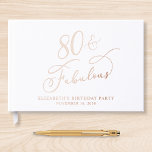 Elegant 80th Birthday Party Rose Gold Guest Book<br><div class="desc">Elegant white guest book for her 80th birthday party featuring rose gold foil and "80 & Fabulous" in a chic calligraphy script. Customise with her name,  the party date and a title on the spine in classic serif typography.</div>