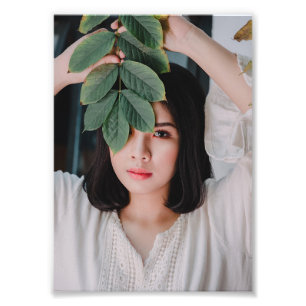 Elegant Asian Woman Holding Green Leaves – Photo Print