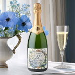Elegant Baroque Floral Frame 21st Birthday Party Sparkling Wine Label<br><div class="desc">A stunning garden-inspired birthday party design featuring an elaborate Baroque-style decorative circular frame adorned with an elegant blend of floral motifs. The dusky blue frame is gracefully draped in delicate Lily of the Valley and Hawthorn flowers, creating a romantic and timeless atmosphere. The intricate detailing of the Baroque elements adds...</div>