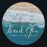 Elegant Beach Blue Ocean Thank You Wedding Favour Classic Round Sticker<br><div class="desc">Beach destination wedding favour stickers featuring a summer tropical beach island background, and a modern text template. For further personalisation, please click the "Customise it" button to modify this template. All text style, colours, and sizes can be modified to suit your needs. You will find other matching wedding items at...</div>