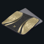 Elegant Black And Gold Damasks Dynamic Stripe Laptop Sleeve<br><div class="desc">Elegant gold tones and black vintage floral damasks combination with gold dynamic lines accents and customisable monogram.</div>