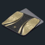 Elegant Black And Gold Damasks Dynamic Stripe Laptop Sleeve<br><div class="desc">Elegant gold tones and black vintage floral damasks combination with gold dynamic lines accents and customisable monogram.</div>