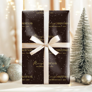 Elegant Black and Gold Merry Christmas Family Name Wrapping Paper