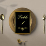 Elegant Black and Gold Wedding Reception Table Number<br><div class="desc">Elevate your event with these elegant black and gold table number cards. Perfect for a sophisticated and luxe wedding reception, they enhance your tablescape with an aura of classy chic. These table numbers embody style, luxury, and sophistication, making a bold statement with their striking black and gold design. Each card...</div>