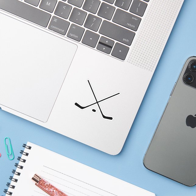 Elegant black and white Hockey Sticks and Puck (Laptop w/ iPhone)