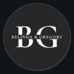 Elegant Black and White Monogram Initials Wedding Classic Round Sticker<br><div class="desc">A minimalist black and white monogram initials wedding design. A simple design that uses the bride's and groom's initials and names to create an elegant classic monogram. A charming black and white minimalist monogrammed design with classy script typography. An elegant black and white monogram initials themed wedding sticker design with...</div>