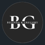 Elegant Black and White Monogram Initials Wedding Classic Round Sticker<br><div class="desc">A minimalist black and white monogram initials wedding design. A simple design that uses the bride's and groom's initials and names to create an elegant classic monogram. A charming black and white minimalist monogrammed design with classy script typography. An elegant black and white monogram initials themed wedding sticker design with...</div>