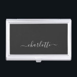 Elegant Black and White Script Name Personalised   Business Card Holder<br><div class="desc">A clean and sophisticated business card case featuring a solid black backdrop with an elegant white calligraphy-style name centred for a refined personal touch. This look is perfect for professionals, entrepreneurs, or students who want a minimalist aesthetic with a stylish, modern edge. The contrast of dark and light keeps it...</div>