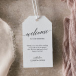 Elegant Black Calligraphy Wedding Welcome Gift Tags<br><div class="desc">These elegant black calligraphy wedding welcome gift tags are perfect for a simple wedding. The neutral design features a minimalist gift tag decorated with romantic and whimsical typography. Personalise the tags with the location of your wedding, a short welcome note, your names, and wedding date. These tags are perfect for...</div>