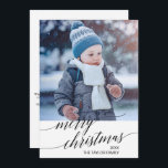 Elegant Black Calligraphy Year In Review Photo Holiday Card<br><div class="desc">This elegant black calligraphy year in review photo holiday card is the perfect simple Christmas greeting. The neutral design features a minimalist holiday card decorated with romantic and whimsical typography. Personalise the card with your family name, first names, and year. Include a year in review or family newsletter on the...</div>