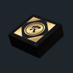Elegant Black Gold Custom Initial Gift Box<br><div class="desc">An upscale gold on gold design with black accents and black initial or monogram you can easily customize. Great for jewelry, coins, keepsakes, on Christmas, birthdays, anniversary, graduation, job promotion, any time your heart desires. Svelte and sophisticated, this original design is sure to please. Take advantage of ongoing Zazzle sales....</div>