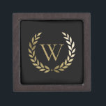 Elegant Black Gold Laurel Wreath Monogram Gift Box<br><div class="desc">Wrap your gift style with this elegant personalised gift box featuring a faux gold monogram framed with a gold laurel wreath on a simple black background. Designed by Susan Coffey.</div>