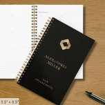 Elegant Black Gold Logo Planner<br><div class="desc">Stay organised and elevate your brand with our Elegant Black and Gold Planner, customisable with your logo. Featuring a sleek black cover adorned with a refined gold diamond emblem, this planner combines style and functionality. Perfect for mapping out your schedule, tracking goals, or managing client appointments, this personalised planner is...</div>