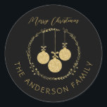 Elegant Black Gold Merry Christmas Family Name Classic Round Sticker<br><div class="desc">Make a stunning impression with this elegant Black Gold Wreath Merry Christmas Family Name design. The captivating design features a wreath adorned with shimmering gold glitter and festive baubles, creating a perfect blend of sophistication and holiday cheer. Customise the text and spread the joy of the season with this glamourous...</div>