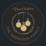 Elegant Black Gold Merry Christmas Family Name Classic Round Sticker<br><div class="desc">Make a stunning impression with this elegant Black Gold Wreath Merry Christmas Family Name design. The captivating design features a wreath adorned with shimmering gold glitter and festive baubles, creating a perfect blend of sophistication and holiday cheer. Customise the text and spread the joy of the season with this glamourous...</div>