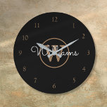 Elegant Black Gold Monogram Script Name Large Clock<br><div class="desc">Classic black and gold monogram wall clock. You can personalize the name,  monogram and customize the font and colors to create your own unique design. Designed by Thisisnotme©</div>