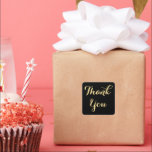 Elegant Black Gold Party Favours Wedding Thank You Square Sticker<br><div class="desc">Custom,  personalised,  elegant typography,  black and golden yellow,  script thank you square sticker. An elegant thank you sticker for sealing your party favours for wedding,  anniversary celebrations,  receptions,  ceremonies,  birthday,  bridal shower,  baby shower,  holidays,  or any other special occasion.</div>
