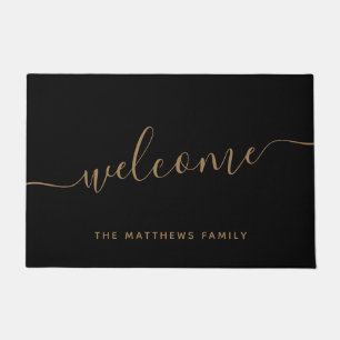 Elegant Black Gold Script Family Name Welcome Doormat