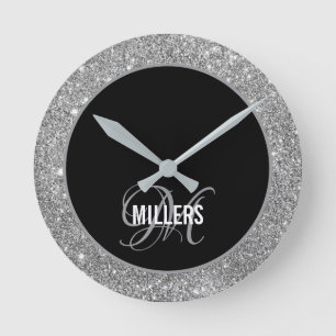Elegant black silver glitter monogram family name round clock