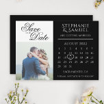 Elegant Black Wedding Calendar Photo  Save The Date<br><div class="desc">Announce your wedding date in style with these elegant black save the date cards. The design features simple typography and a personalised wedding calendar on which you can mark your wedding day with a cute white heart. Customise the cards even further with a romantic couple's photograph, names, and the location...</div>