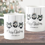 Elegant Black White Christmas Coffee Mug<br><div class="desc">Add a chic and festive touch to your winter mornings with this beautifully designed coffee mug. The design appears on both sides and features three delicate watercolor ornaments in soft black and white shades, accented by evergreen greenery and bow details for a trendy and sophisticated look. "Merry Christmas" is written...</div>