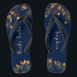 Elegant Bride Tribe Gold Foliage Navy Blue Thongs<br><div class="desc">These elegant bride tribe gold foliage pattern navy blue flip flops have a dark blue background that is adorned with an intricate gold floral greenery pattern and customisable modern typography. The combination of the rich navy and the shimmering gold create an elegant and luxurious aesthetic. It's a beautiful gift for...</div>