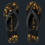 Elegant Bridesmaid Black & Gold Foliage Pattern Thongs<br><div class="desc">These elegant bridesmaid black and gold foliage pattern flip flops boasts a luxurious black and gold palette, with a stunning golden floral pattern and modern typography set against a black background, exuding elegance and sophistication. It's a beautiful gift for your bridal party. View the collection on this page to find...</div>