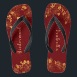 Elegant Bridesmaid Deep Burgundy & Gold Floral Thongs<br><div class="desc">These elegant bridesmaid Deep Burgundy and gold floral pattern flip flops have a dark burgundy background that is adorned with an intricate gold floral greenery pattern and customisable modern typography. The combination of the rich burgundy and the shimmering gold create an elegant and luxurious aesthetic. It's a beautiful gift for...</div>