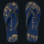 Elegant Bridesmaid Gold Floral Navy Blue Thongs<br><div class="desc">These elegant bridesmaid gold floral pattern navy blue flip flops have a dark blue background that is adorned with an intricate gold floral greenery pattern and customisable modern typography. The combination of the rich navy and the shimmering gold create an elegant and luxurious aesthetic. It's a beautiful gift for your...</div>