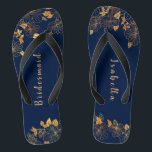 Elegant Bridesmaid Gold Floral Navy Blue Thongs<br><div class="desc">These elegant bridesmaid gold floral pattern navy blue flip flops have a dark blue background that is adorned with an intricate gold floral greenery pattern and customisable modern typography. The combination of the rich navy and the shimmering gold create an elegant and luxurious aesthetic. It's a beautiful gift for your...</div>